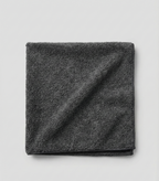 AutoPrro Folded dark gray towel on a light gray background