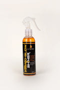 A spray bottle of Autoprro Interio-Glow Shiner with orange liquid visible through the transparent spray nozzle.